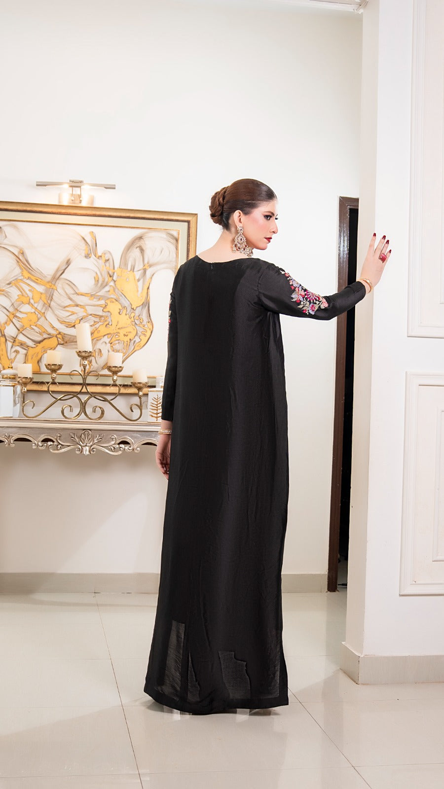Shop Black Shadow by FAMA by Sana Sarah's, a breathtaking jet-black stitched formal suit featuring intricate tonal embroidery, wide-leg trousers, and a graceful dupatta.