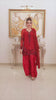 Shop Ruby by FAMA by Sana Sarah's, a stunning 3-piece ruby red hand-embellished festive outfit featuring a detailed chiffon shirt, silk flared trousers, and a draped dupatta.
