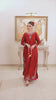 Shop Red Orchid by FAMA by Sana Sarah's, a stunning floor-length crimson silk tunic featuring turquoise and pink floral embroidery, side slit borders, and festive tassel details.